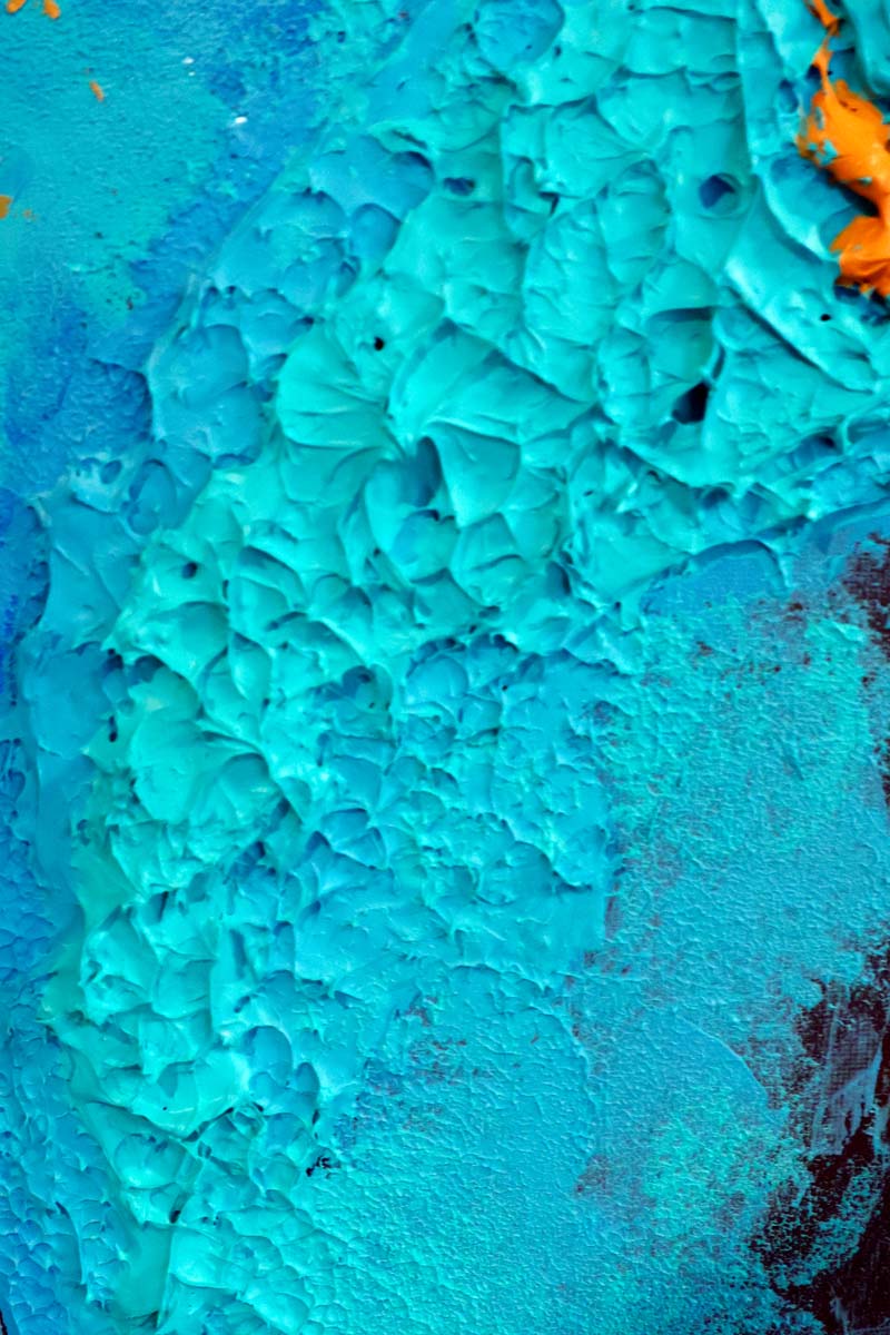 A close up shot of the texture of the blue paint